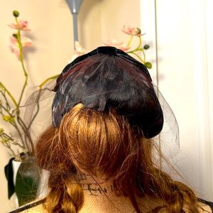 Vintage black feathered hat with veil